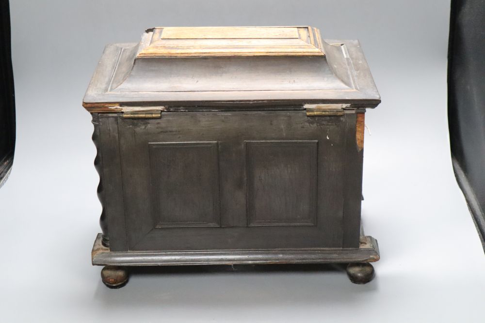 An 18th/19th century Continental ebony veneered table cabinet of drawers (modified)